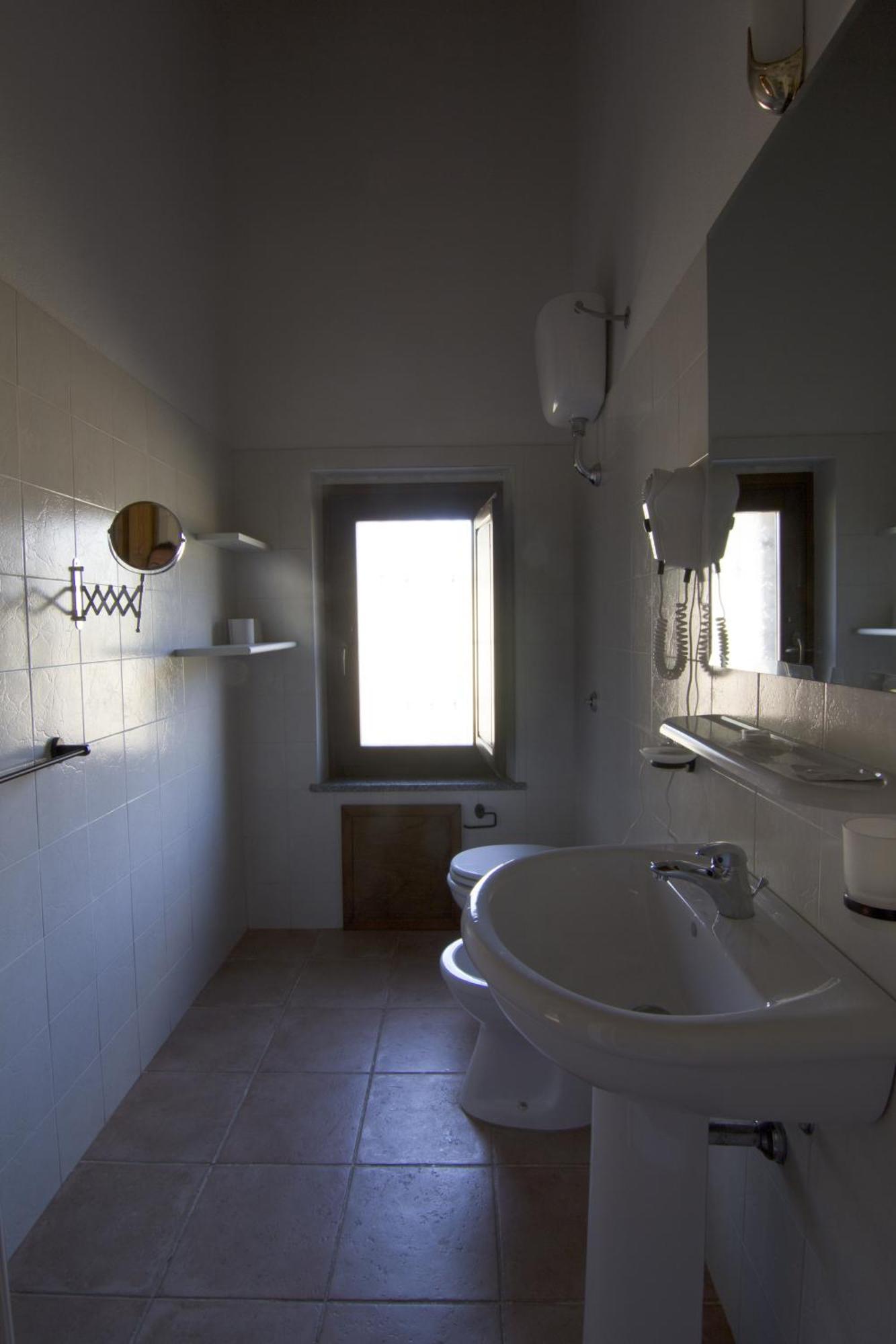 Agriturismo Sa Rocca Iglesias Værelse billede